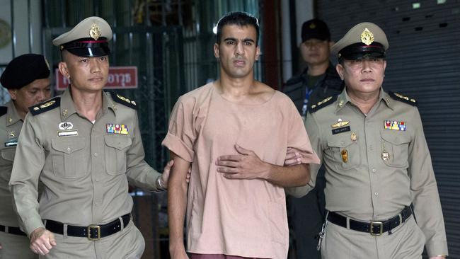 FILE - In this Monday, Feb. 4, 2019, file photo, refugee soccer player Bahraini Hakeem al-Araibi leaves the criminal court in Bangkok, Thailand. A Thai court on Monday, Feb. 11, 2019, has ordered the release of al-Araibi after prosecutors said they were no longer seeking his extradition to Bahrain. (AP Photo/Sakchai Lalit, File)