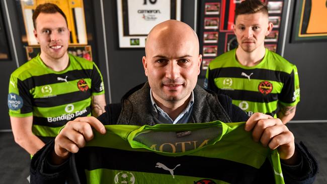 Coach of the Dandenong Thunder FC Veton Korcari (centre) and players LEFT Brandon Barnes and RIGHT Josh Bragg in their clubrooms. They'll wear green and black for their last home match of the season in support of  Team 11.. the bid to get an A-League and W-League football team in Melbourne's South East. PICTURE : PENNY STEPHENS. 21ST AUGUST 2018