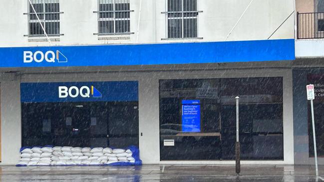 Lismore’s CBD is deserted on Friday morning, with shopfronts sandbagged ahead of predicted flooding amid fears the city’s levee will be breached. Picture Remy Varga