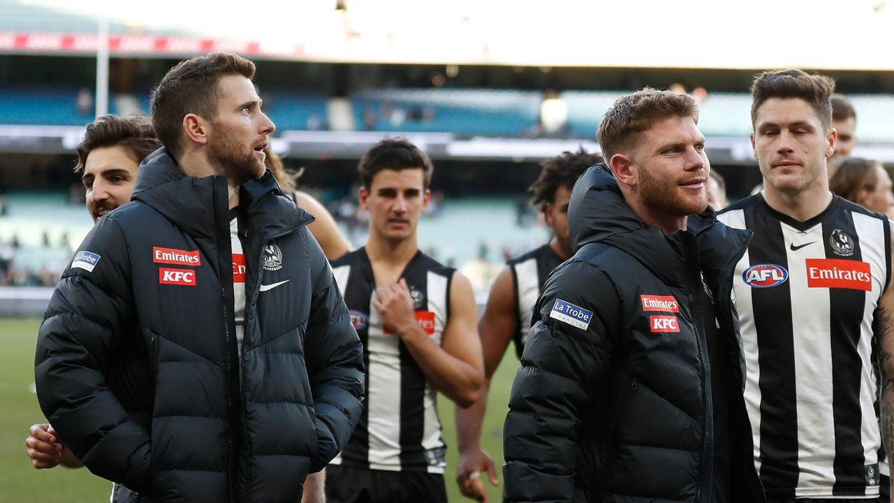 Pies pair Jeremy Howe (left) and Taylor Adams were unable to finish Saturday’s game against Port Adelaide. Picture: Getty Images