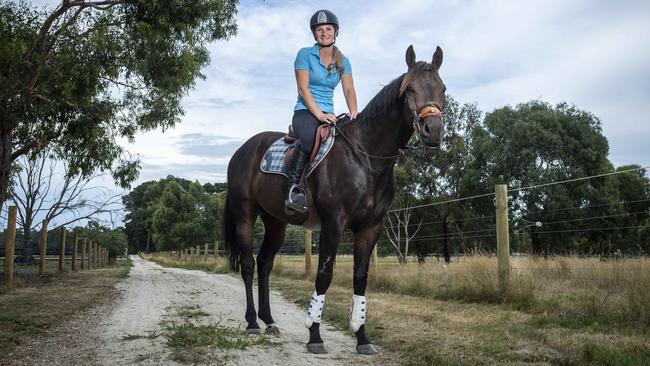 ‘I don’t do much other than ride horses’ Kah says, pictured with horse Bras. Picture: Jake Nowakowski