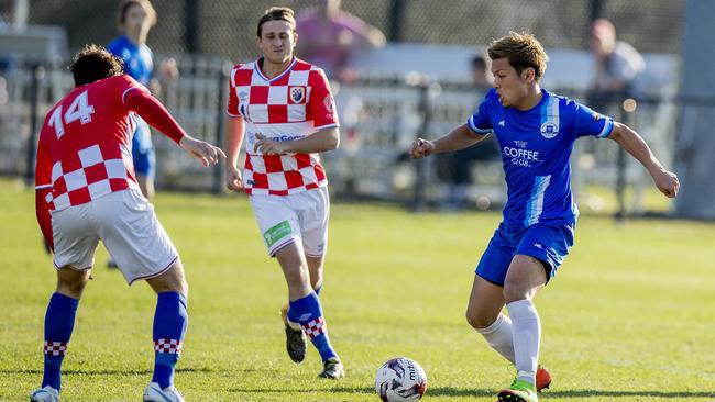 Surfers Paradise's Yuji Kin takes on the Knights defence. Picture: Jerad Williams