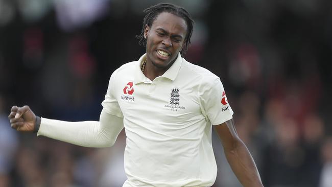 Jofra Archer celebrates after taking the wicket of Australia's David Warner on day five of the second Test. Picture: Alastair Grant/AP