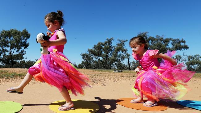 Poppy and Millie Bell play in the outback town of Menindee.