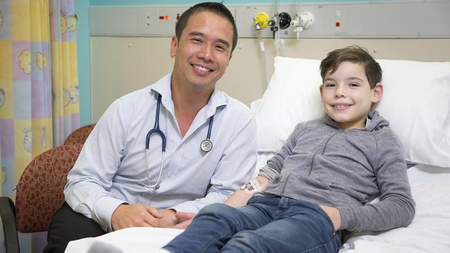 Paediatric specialist Dr Seth Ung treats patient Connor Rose, 8, at Campbelltown Hospital. Pictures: Melvyn Knipe