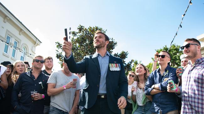 Swiss 8 Adrian Sutter pictured tossing the coins for Anzac Day Two up at the Clovelly Hotel. Picture: Monique Harmer