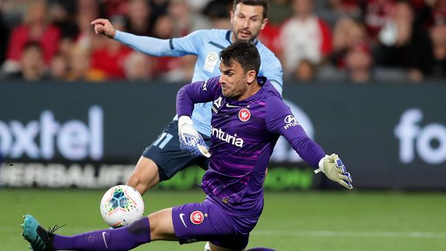 Sydney FC striker Kosta Barbarouses has his shot blocked by Wanderers goalkeeper Daniel Lopar. Picture: Getty Images