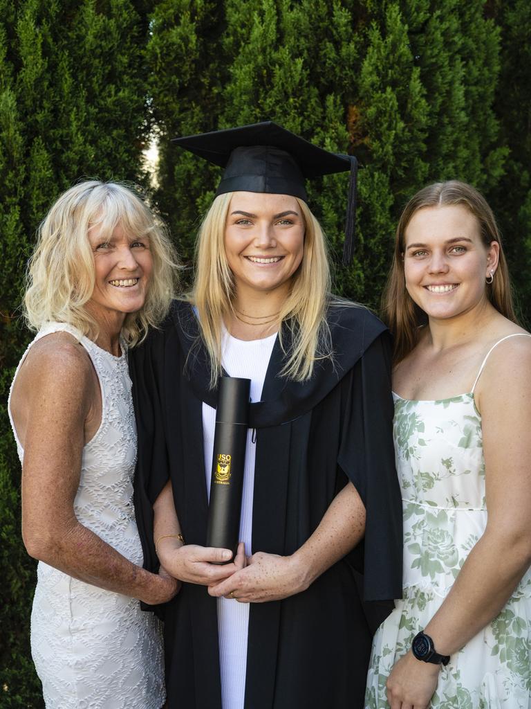 Bachelor of Sport and Exercise Science (Honours) graduate Briana Dascombe with mum Helen Dascombe and sister Cassie Dascombe at the UniSQ graduation ceremony at Empire Theatres, Wednesday, December 14, 2022.