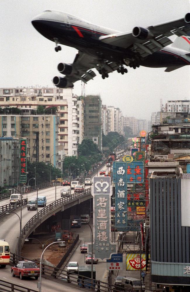 It was one of the most challenging airports to land at because pilots had to navigate through rugged mountains and high-rise buildings. Picture: Mike Fiala/ AFP