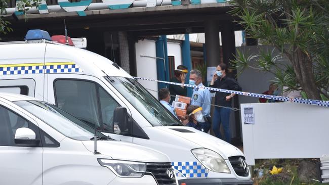 Supplies are carried into the Aquarius backpackers hostel in Byron Bay during a Covid lockdown on Saturday. Picture: Tessa Flemming