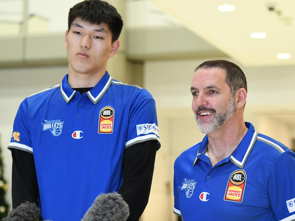 Brisbane Bullets general manager Sam Mackinnon speaks to the media after seven-foot five basketballer Chuanxing Liu arrived in Brisbane. Picture: Getty Images