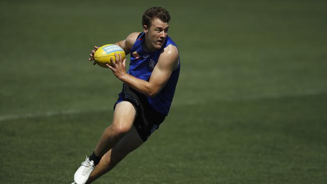 MELBOURNE, AUSTRALIA – JANUARY 13: Jack Macrae of the Bulldogs in action during a Western Bulldogs AFL training session at Whitten Oval on January 13, 2021 in Melbourne, Australia. (Photo by Daniel Pockett/Getty Images)