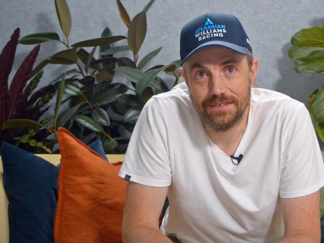 Atlassian co-founder and chief executive Mike Cannon-Brookes dons an Atlassian Williams Racing cap as he announces the new partnership.