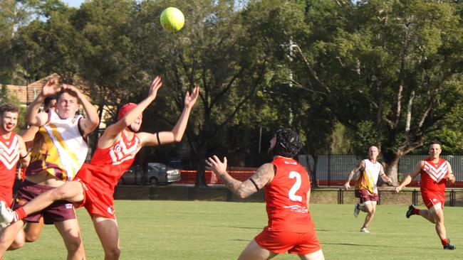 CONCUSSION GUIDELINES: Two of the Lismore Swans players sported head protection at the match with the Casino Lions on Saturday April 24, 2021. On April 27, 2021, the AFL released its updated concussion guidelines, Photo: Alison Paterson