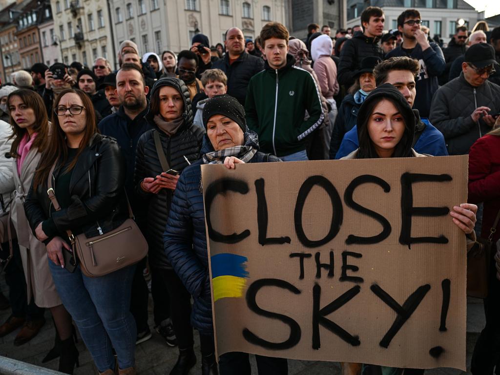 People wait ahead of Joe Biden’s speech in Warsaw. Picture: Getty Images