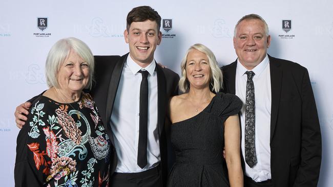 Zak Butters with his grandmother Robyn Russell, Renee Butters, and Wayne Butters at the Port Adelaide Football Club’s best-and-fairest at the Adelaide Convention Centre. Picture: Matt Loxton