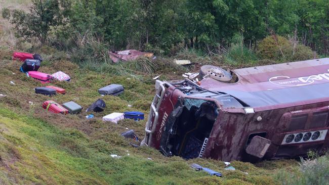 The school bus flipped on the Western Highway near Bacchus Marsh. Picture: Brendan Beckett