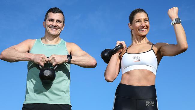 Rob and Gina Orsillo are keen users of fitness trackers. Picture : Ian Currie