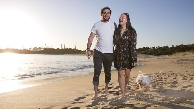 Botany couple Dov Royal and Prielle Betito with dog Mocha at Yarra Bay. Picture: Dylan Robinson