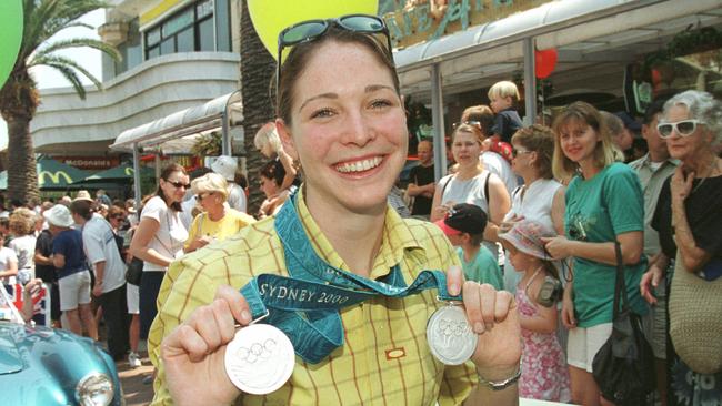 Giaan Rooney with her medals during a tickertape parade.