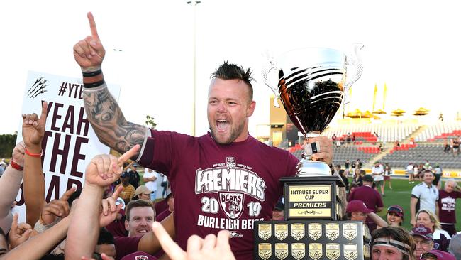 Burleigh Bears player Luke Page with the trophy. Intrust Super Cup grand final between Wynnum Manly Seagulls and Burleigh Bears. Sunday September 29, 2019. (AAP image, John Gass)