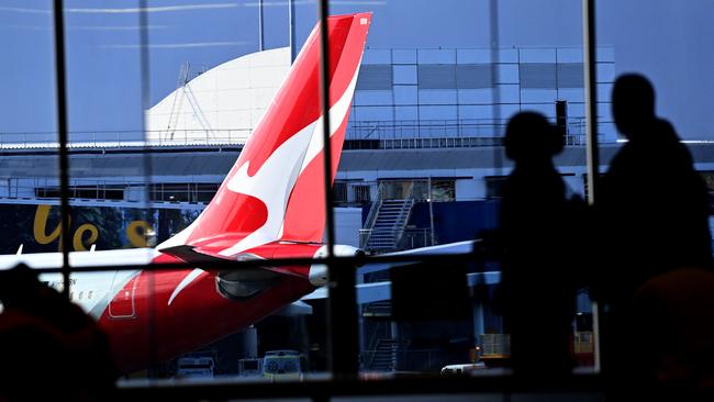 SYDNEY, AUSTRALIA - NewsWire Photos JULY 29, 2022: General scenes of a Qantas plane at the arrival gate at SydneyÃs International AirportPicture: NCA NewsWire / Jeremy Piper