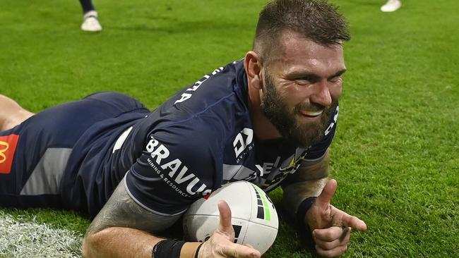 *Kyle Feldt of the Cowboys celebrates after scoring a try during the round 24 NRL match between North Queensland Cowboys and Canberra Raiders at Qld Country Bank Stadium, on August 17, 2024, in Townsville, Australia. (Photo by Ian Hitchcock/Getty Images)