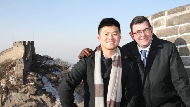 Victorian Premier Daniel Andrews, right, with adviser Mike Yang in China.