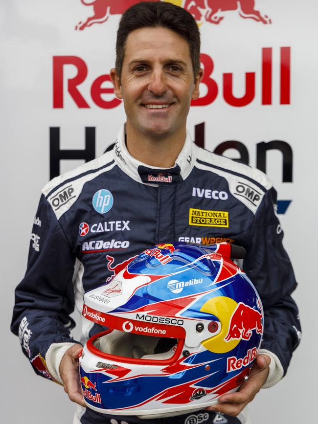Jamie Whincup with a helmet by Antman designs.