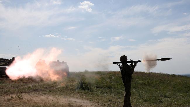 A Ukrainian serviceman fires a rocket launcher during a training exercise not far from front line in Donetsk region last week. Picture: AFP