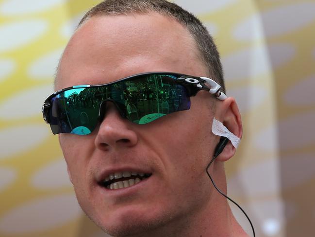 YORK, ENGLAND - JULY 06: Chris Froome of Great Britain and Team Sky looks on during sign in prior to stage two of the 2014 Le Tour de France from York to Sheffield on July 6, 2014 in York, United Kingdom. (Photo by Doug Pensinger/Getty Images)