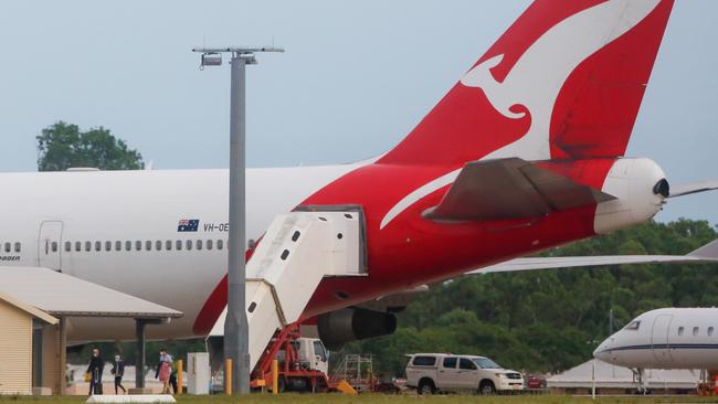 Passengers leave the Qantas jet in Drawin. Picture: Glenn Campbell