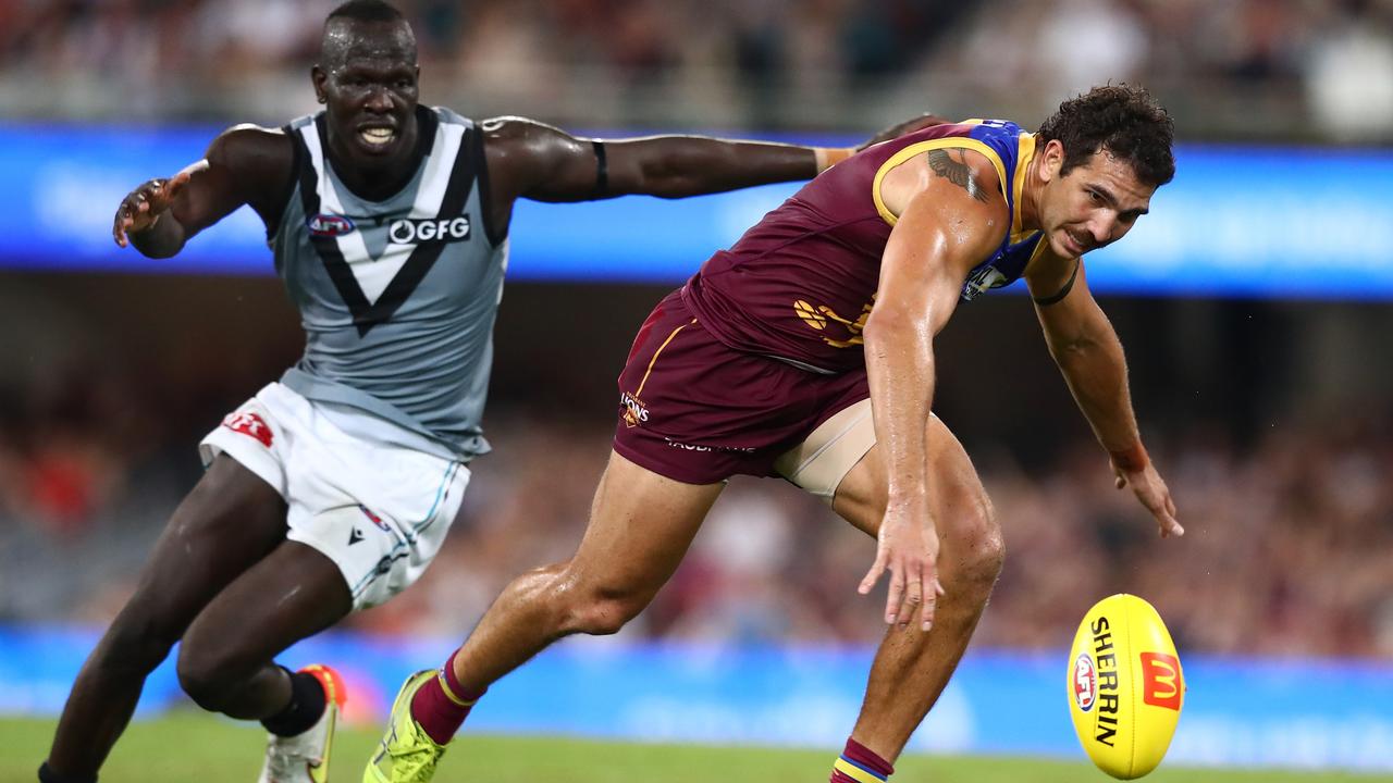 Aliir Aliir (left) suffered an ankle injury in the loss to Brisbane. Picture: Chris Hyde/Getty