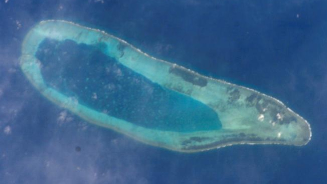 A photograph taken from the International Space Station appears to show China building on the reef in the Paracel Islands. Picture: NASA