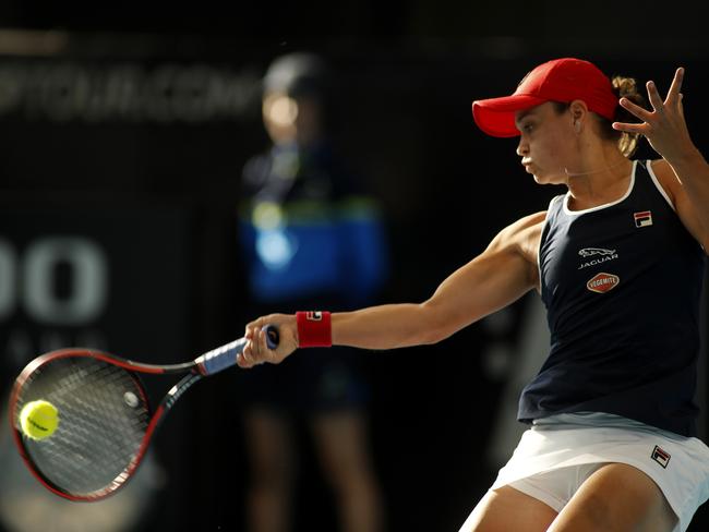 Ashleigh Barty of Australia plays a shot against Danielle Collins of the United States during day 6 of the Adelaide International tennis tournament at Memorial Drive Tennis Centre in Adelaide, Friday, January 17, 2020. (AAP Image/Kelly Barnes) NO ARCHIVING, EDITORIAL USE ONLY