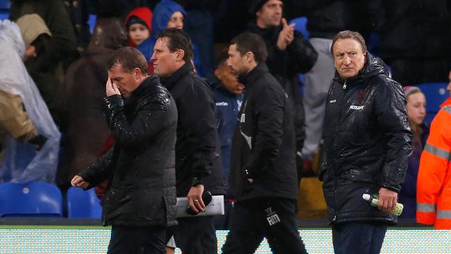 LONDON, ENGLAND - NOVEMBER 23: Brendan Rodgers, manager of Liverpool walks to the dressing room with Neil Warnock, manager of Crystal Palace after the Barclays Premier League match between Crystal Palace and Liverpool at Selhurst Park on November 23, 2014 in London, England. (Photo by Steve Bardens/Getty Images)