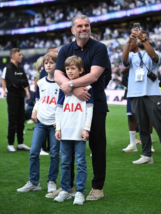 Ange with his family after the Europa League triumph. (Photo by JUSTIN TALLIS / AFP)