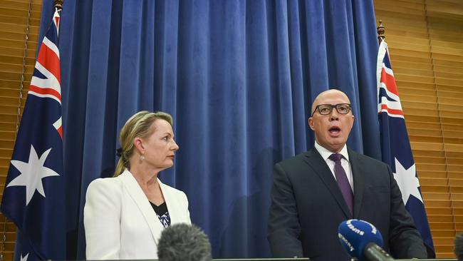 Peter Dutton and Sussan Ley address the media in the opposition party room. Picture: NCA NewsWire / Martin Ollman