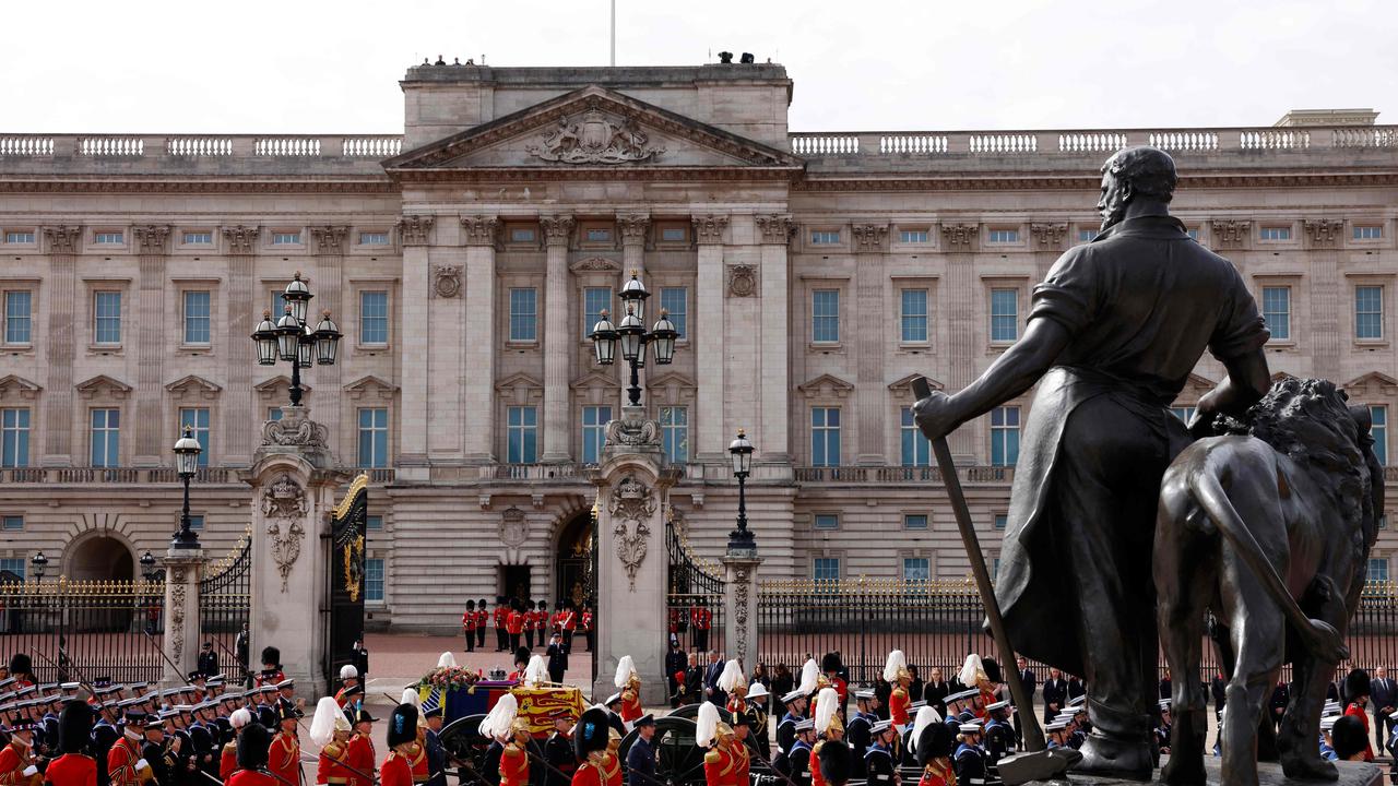 The Procession following the coffin of Queen Elizabeth II, on the State Gun Carriage of the Royal Navy, passes Buckingham Palace on its way to Wellington Arch in London.