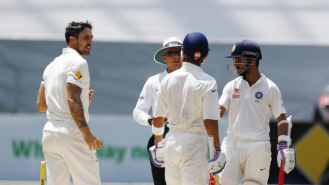 Mitchell Johnson (L) and Virat Kohli (C) clashed on the field as opponents. Picture:Wayne Ludbey