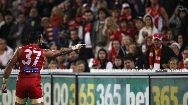 Adam Goodes points out a fan who made a racial comment.