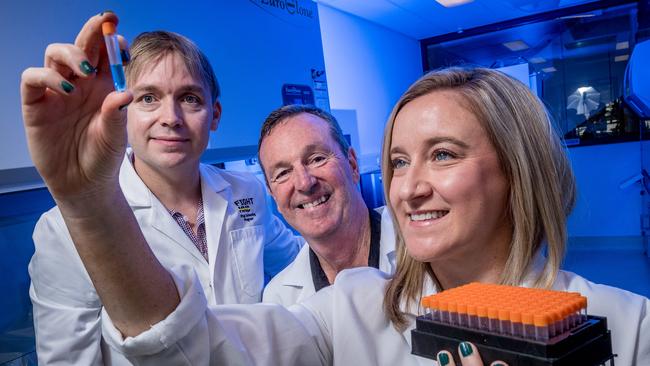 Neale Daniher, pictured with Florey researchers Associate Professor Brad Turner and Dr. Bec Sheen. FightMND has helped raised more than $100 million for MND research. Picture: Jake Nowakowski