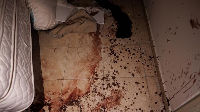 Blood on the floor of a safe room inside a home at Nir Oz.