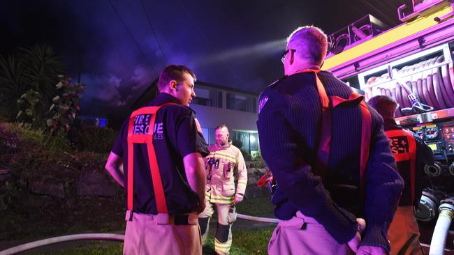 Firefighters attended a house fire in Frenchs Forest where two people were taken to hospital. Picture: Gordon McComiskie