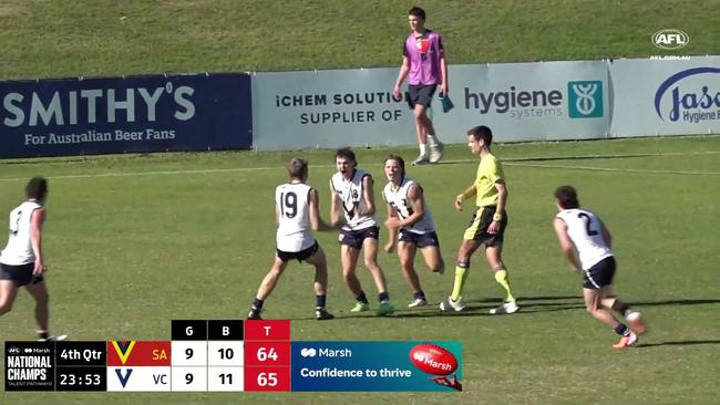 Will Malady celebrates his title-winning behind with teammates. Picture: AFL Play Youtube