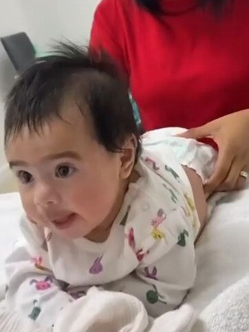 The Sydney chiro performs a treatment on a baby. Source: Instagram