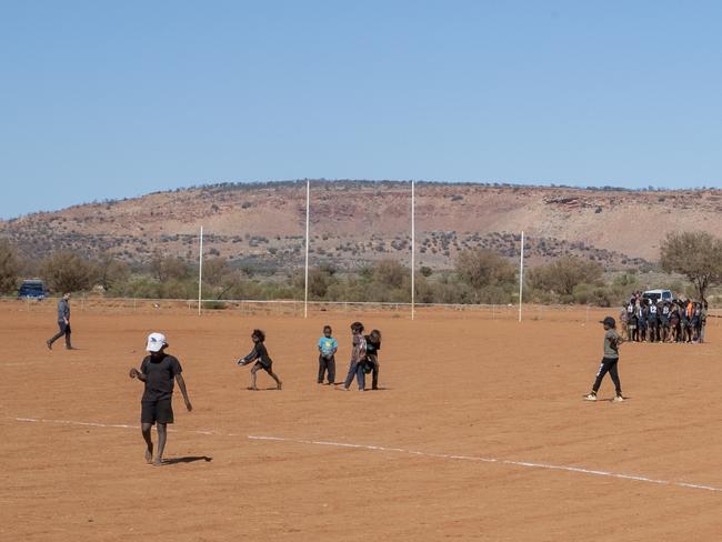 DO NOT USE WITHOUT SPEAKING TO THE ADVERTISER PIC DESK - SAWEEKEND - APY Lands - Local football game in Indulkana, APY Lands, 29 May 2021. Picture Simon Cross