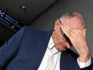 Pieter Jozua Rossouw leaves the police watch-house in Brisbane after appearing in the Brisbane Magistrates Court