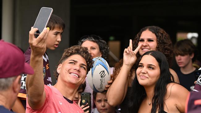 25/9/2023: Reece Walsh signs autographs and during selfies the fans during a Broncos fan training session at the Red Hill, Brisbane. pic: Lyndon Mechielsen/Courier Mail