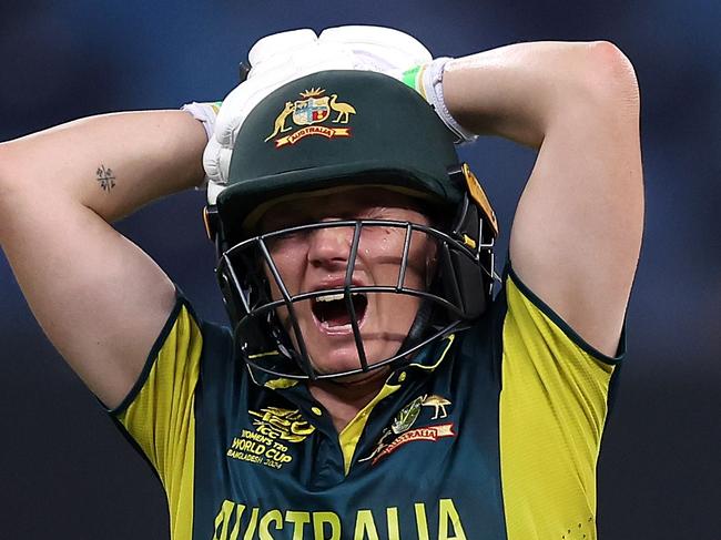 DUBAI, UNITED ARAB EMIRATES - OCTOBER 11: Alyssa Healy of Australia grimaces as she walks off after picking up an injury during the ICC Women's T20 World Cup 2024 match between Australia and Pakistan at Dubai International Stadium on October 11, 2024 in Dubai, United Arab Emirates.  (Photo by Alex Davidson-ICC/ICC via Getty Images)